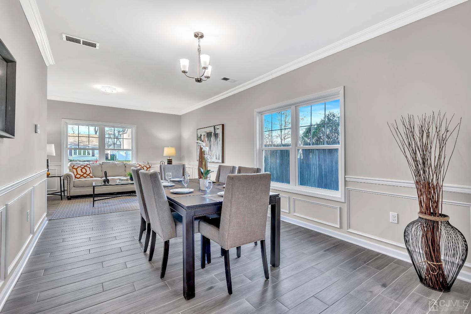 36 Idlewild Road Edison, NJ 08817 - Photo 8 of 34 a view of a dining room with furniture window and wooden floor