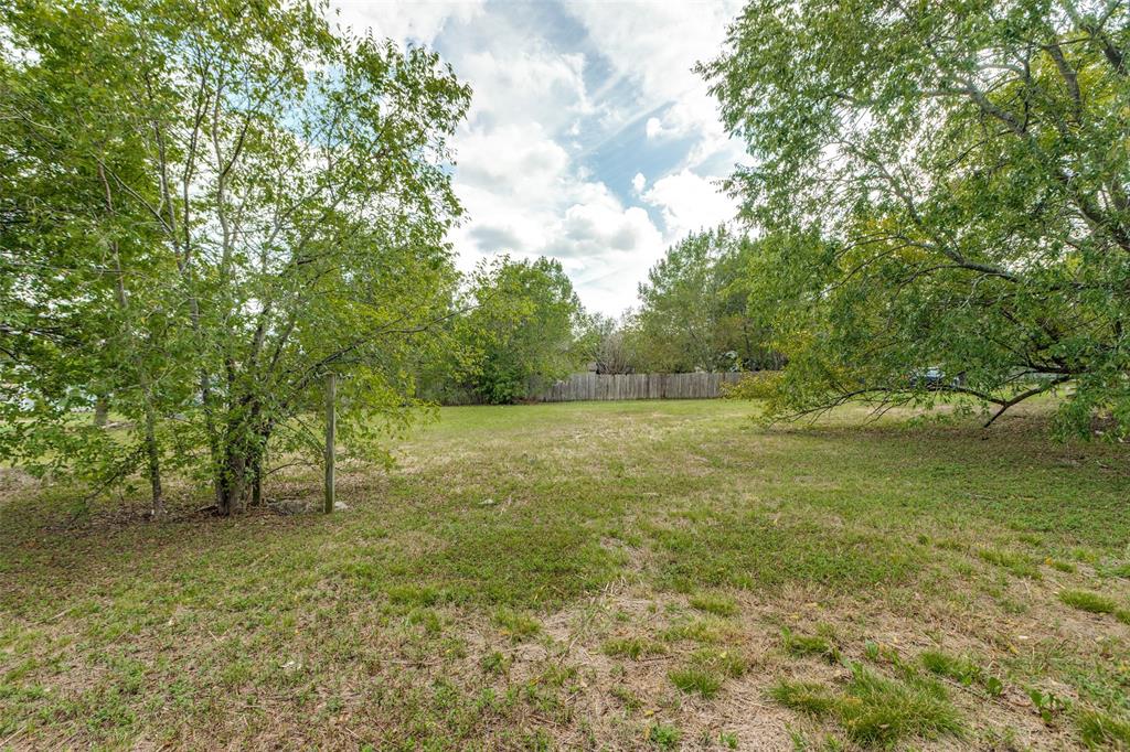 906 Hamilton Street McKinney, TX 75069 - Photo 8 of 13 a view of outdoor space and yard