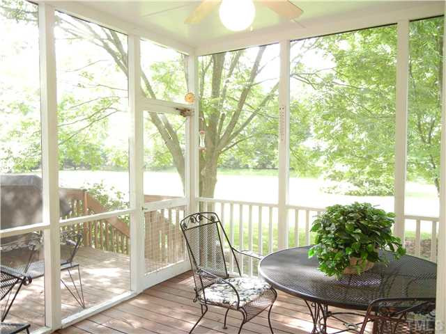 1017 Downing Way Court Raleigh, NC 27614 - Photo 20 of 25 Relax in your spacious and peaceful screened in porch.