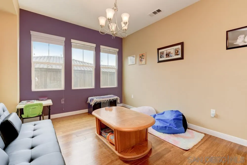 1145 Los Senderos Drive Santee, CA 92071 - Photo 12 of 30 a living room with furniture