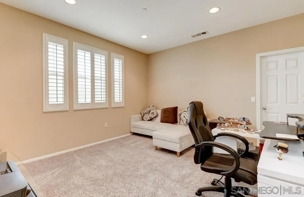 1145 Los Senderos Drive Santee, CA 92071 - Photo 14 of 30 a bedroom with furniture and a window
