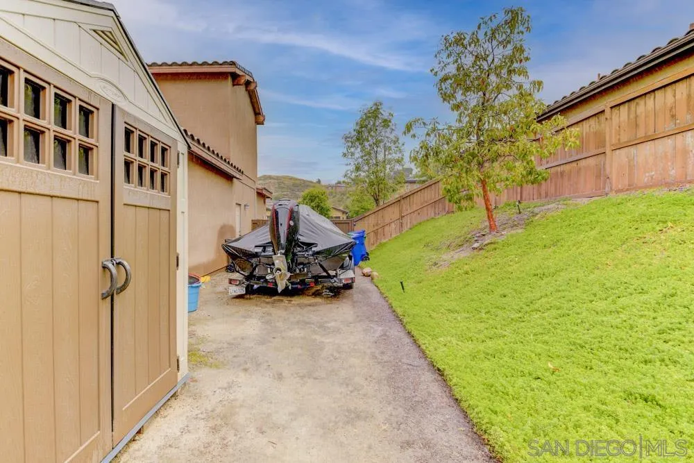 1145 Los Senderos Drive Santee, CA 92071 - Photo 28 of 30 a view of a backyard of the house