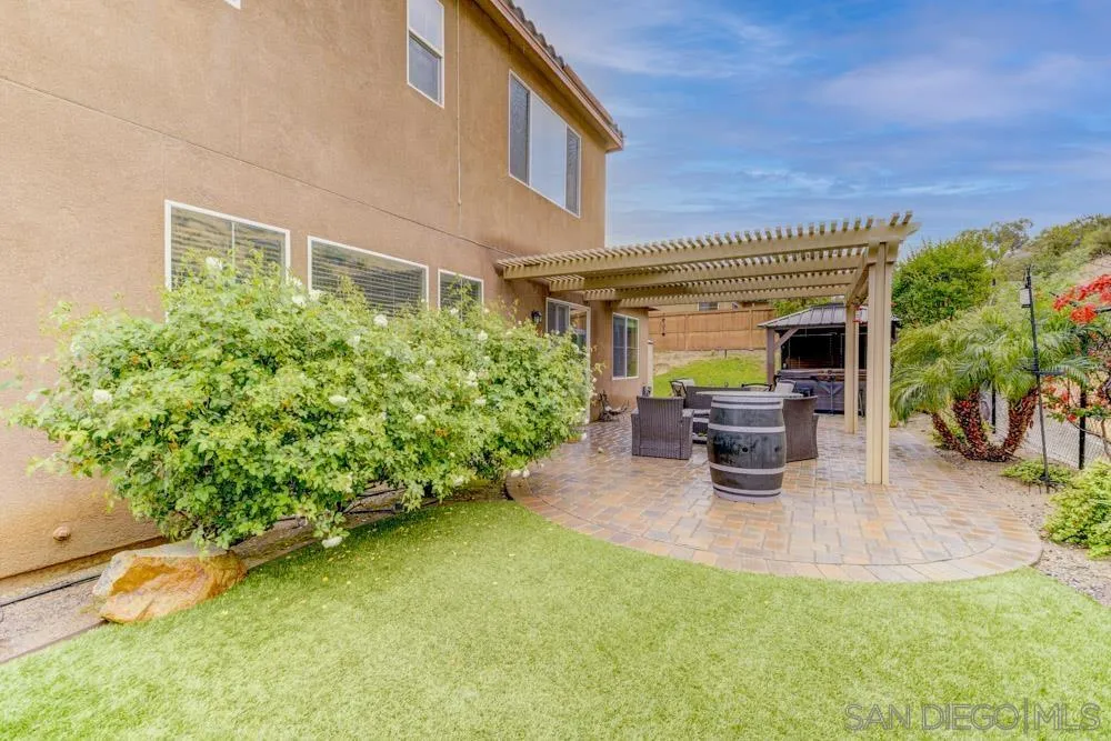 1145 Los Senderos Drive Santee, CA 92071 - Photo 30 of 30 a view of an house with backyard and sitting area