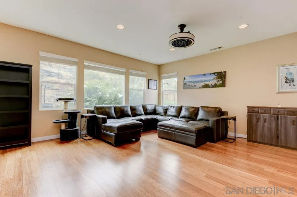 1145 Los Senderos Drive Santee, CA 92071 - Photo 5 of 30 a living room with furniture and a large window