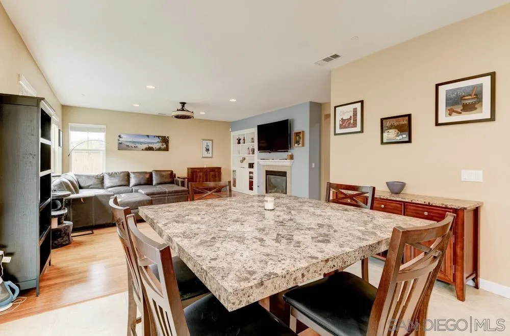 1145 Los Senderos Drive Santee, CA 92071 - Photo 7 of 30 a view of a dining room with furniture