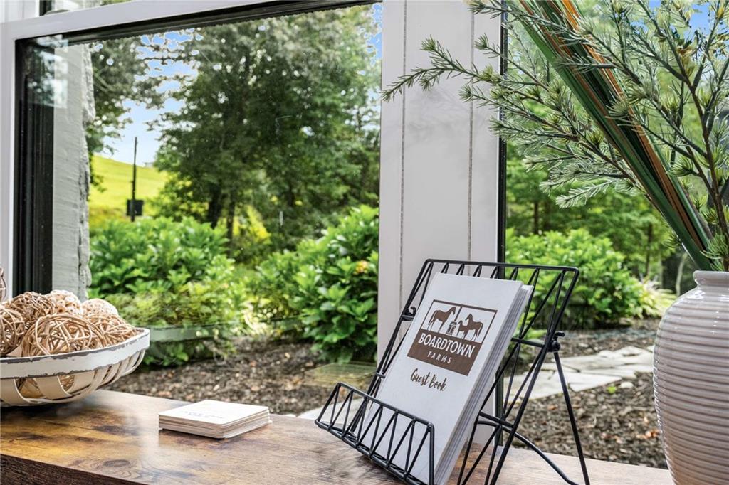 8393 Boardtown Road Ellijay, GA 30540 - Photo 17 of 54 a view of a backyard with sitting area