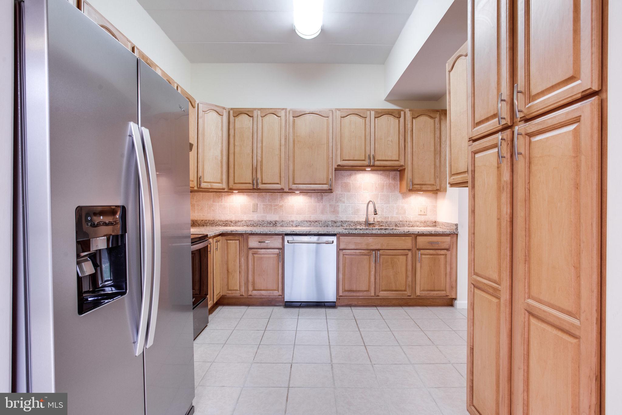 11556 Rolling Green Court, Unit 101 Reston, VA 20191 - Photo 12 of 30 kitchen with built in cabinets