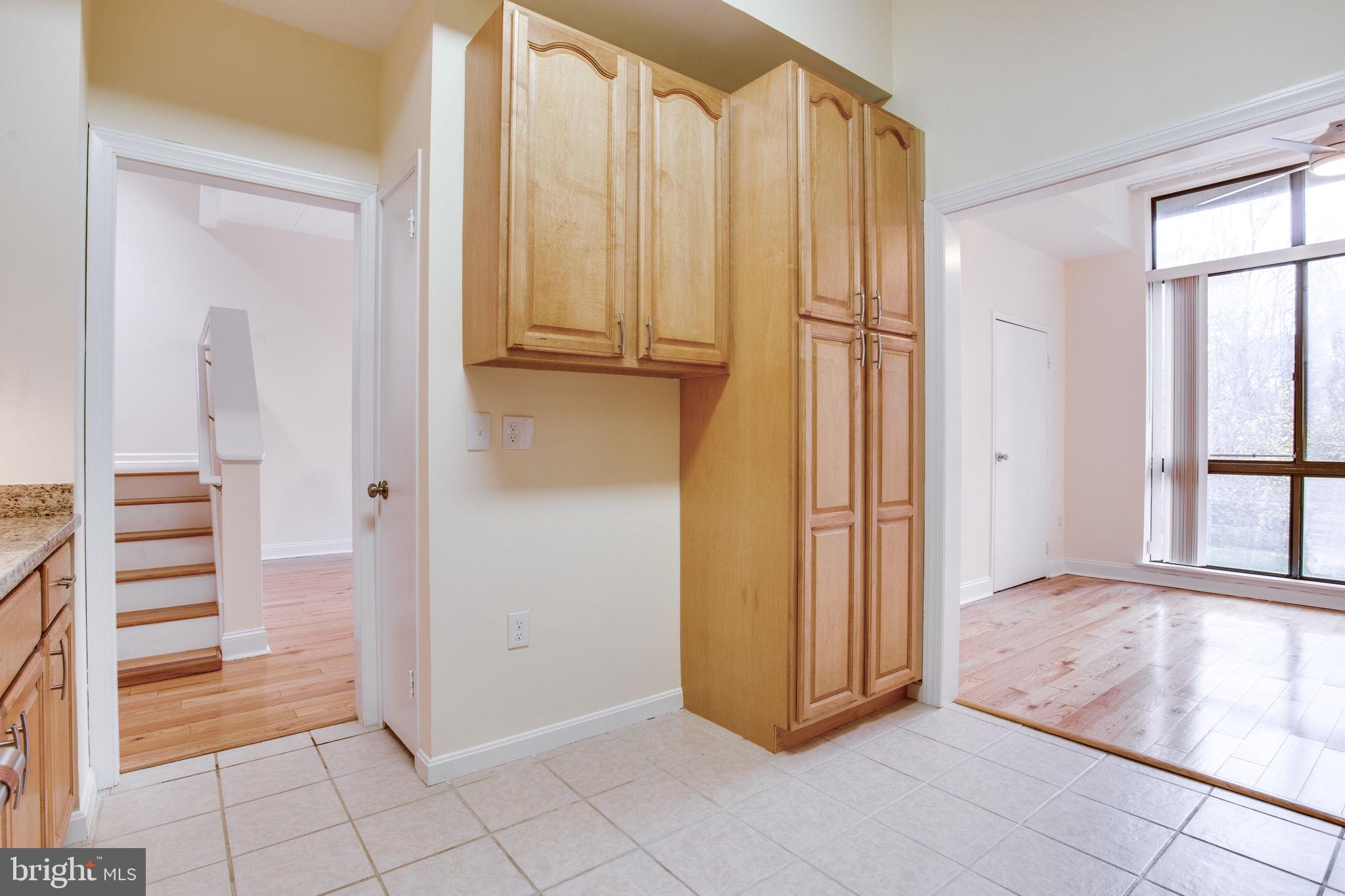11556 Rolling Green Court, Unit 101 Reston, VA 20191 - Photo 14 of 30 Kitchen with additional cabinets