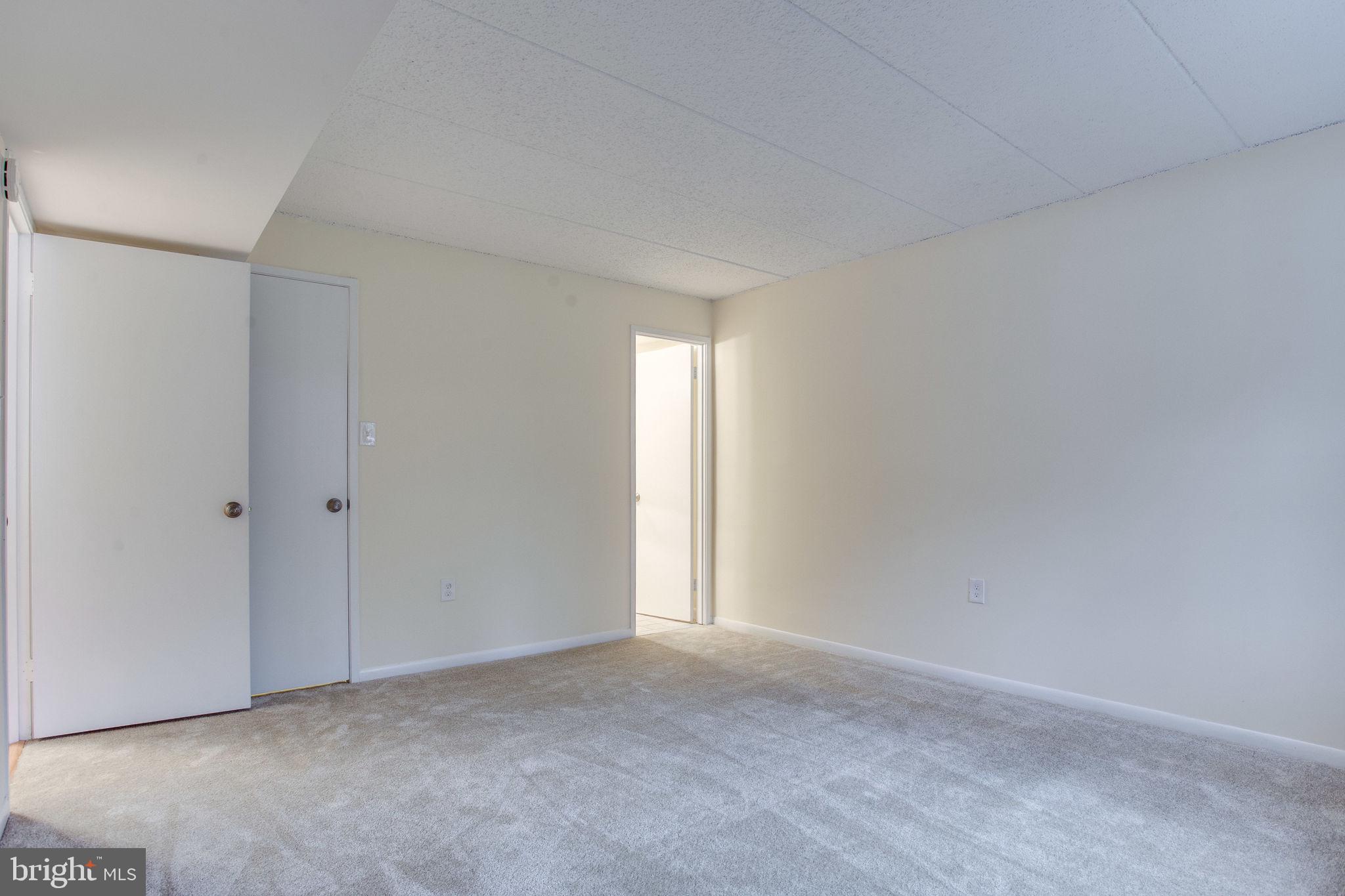 11556 Rolling Green Court, Unit 101 Reston, VA 20191 - Photo 18 of 30 Master Bedroom