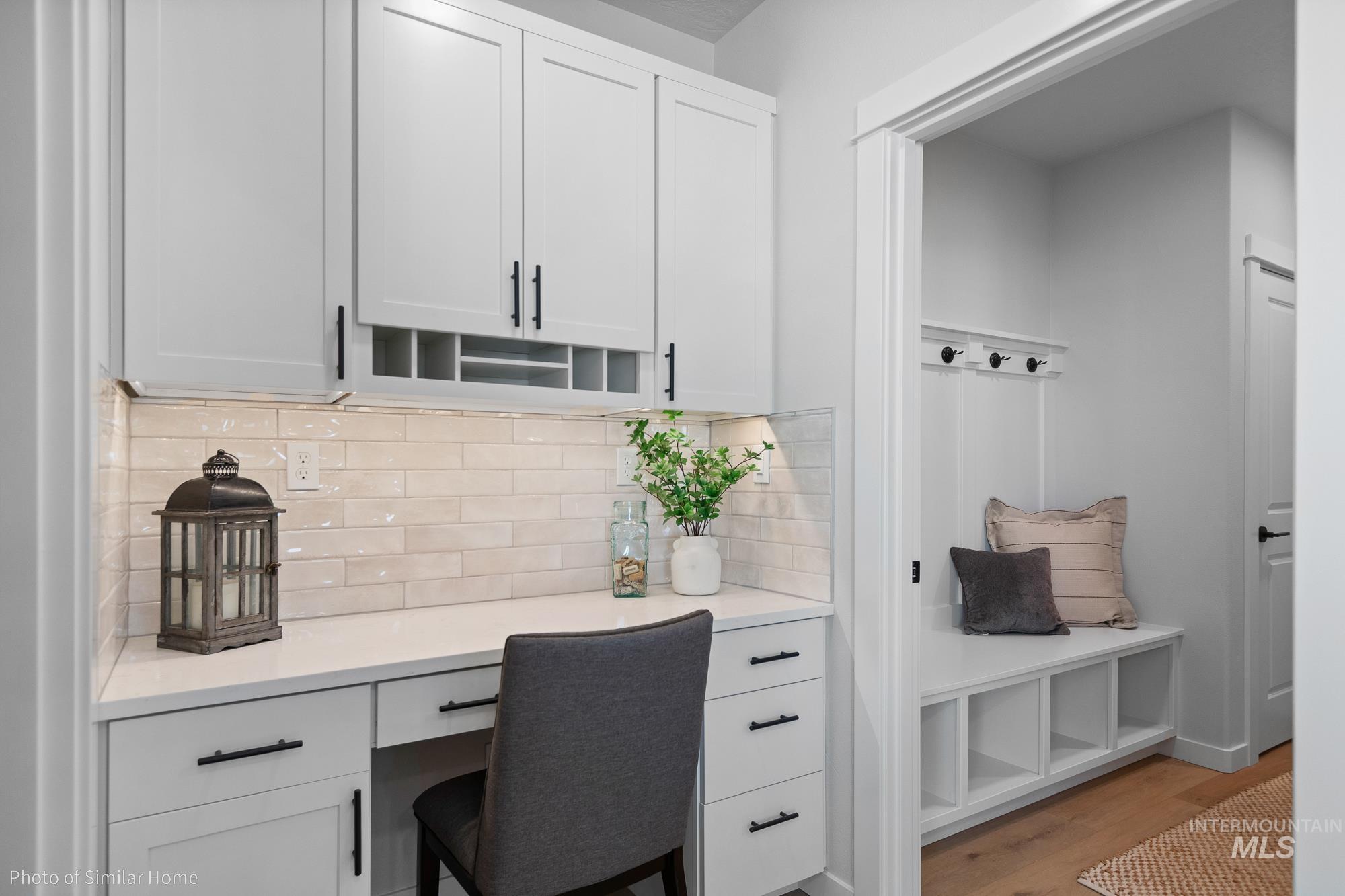 890 Adamite Road Kimberly, ID 83341 - Photo 5 of 16 Home office featuring built in desk and wood finished floors