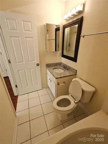 a bathroom with a toilet and a sink
