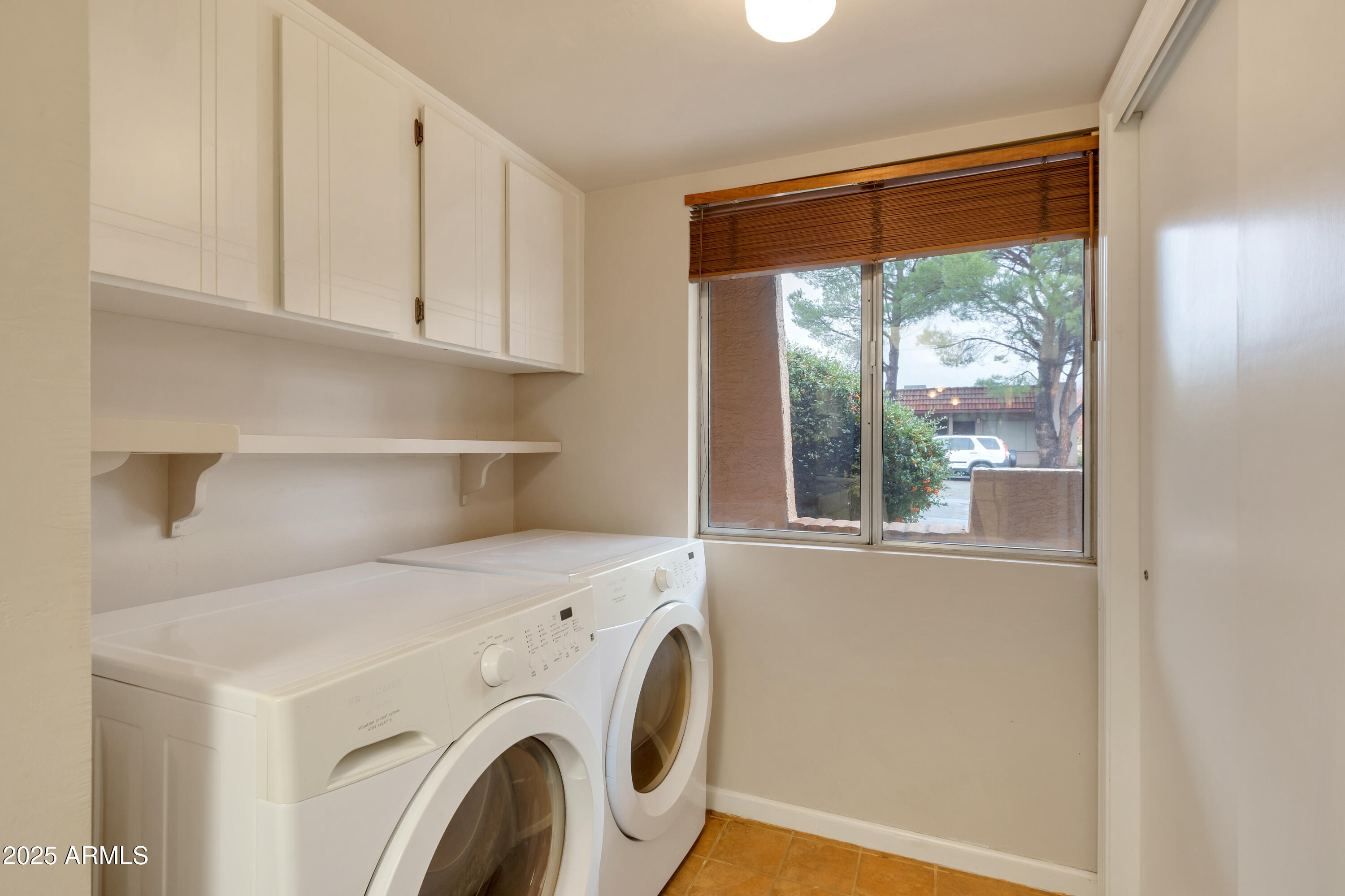 130 Castle Rock Road, Unit 45 Sedona, AZ 86351 - Photo 11 of 38 a utility room with dryer and washer
