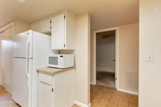 a view of kitchen with a sink