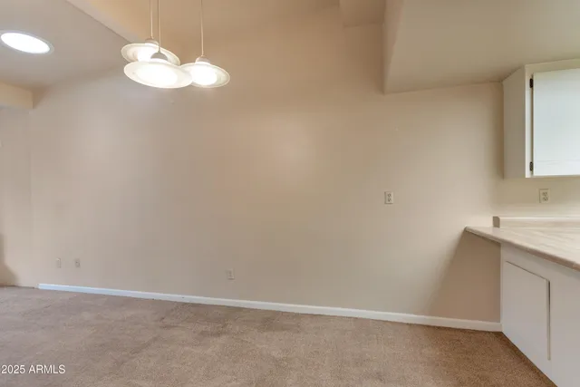a bathroom with a sink vanity and a mirror