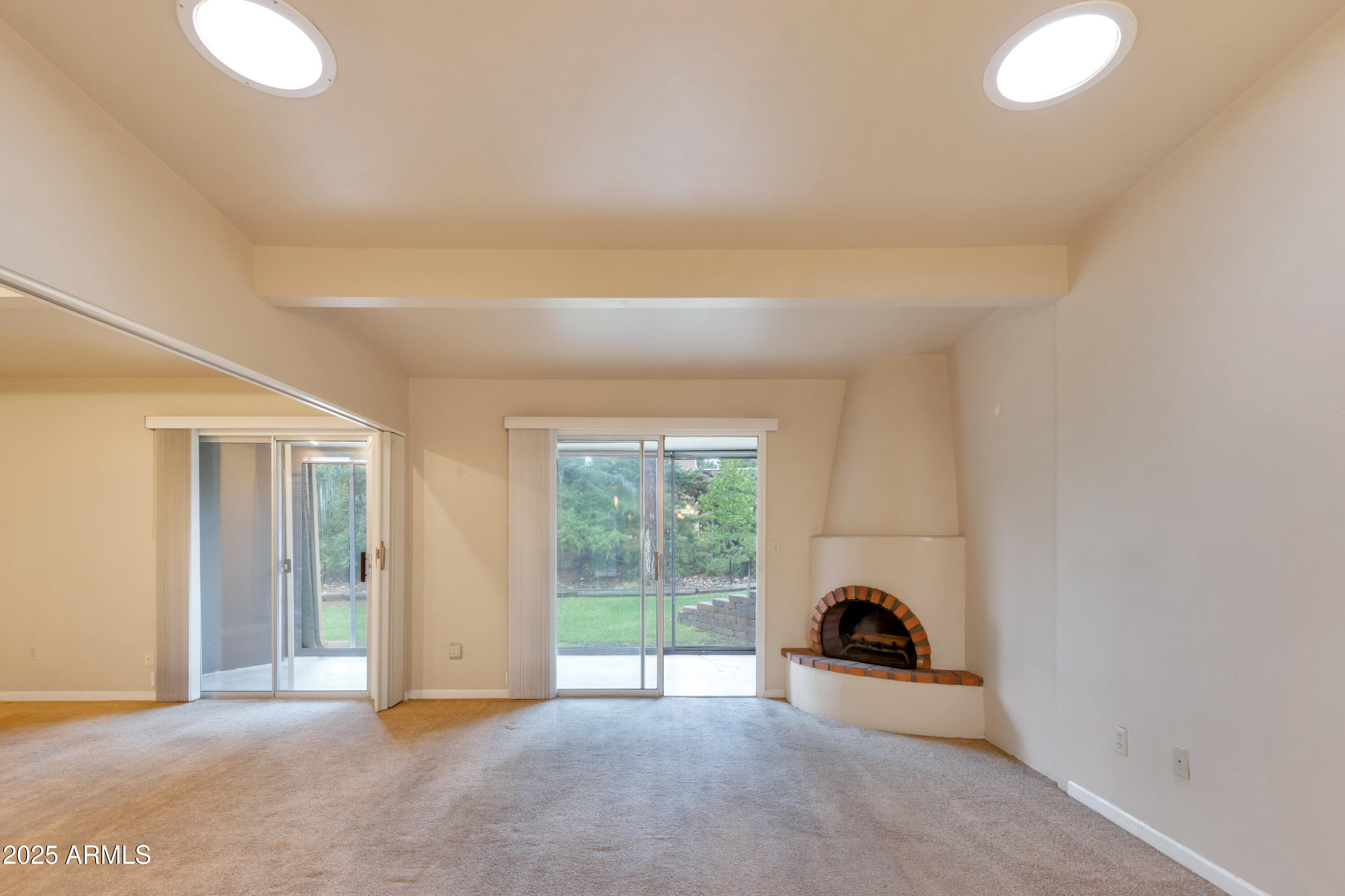 130 Castle Rock Road, Unit 45 Sedona, AZ 86351 - Photo 20 of 38 a view of a livingroom with wooden floor and a window