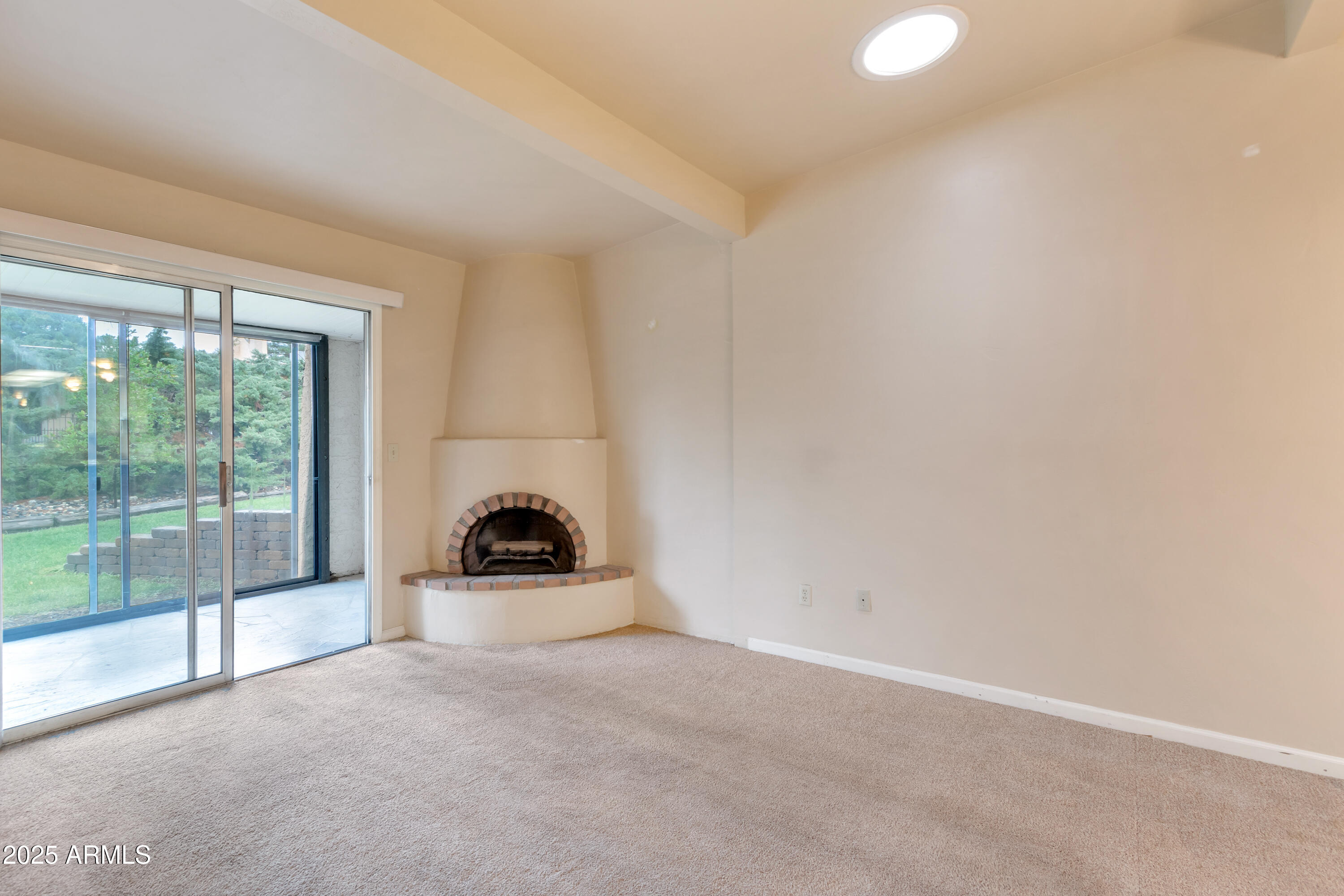 130 Castle Rock Road, Unit 45 Sedona, AZ 86351 - Photo 21 of 38 a view of an empty room and glass door