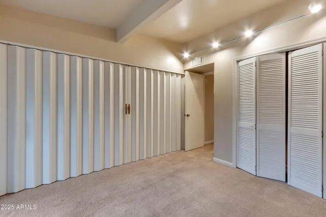 a view of a room with sliding door and mountain view