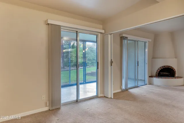 an empty room with windows