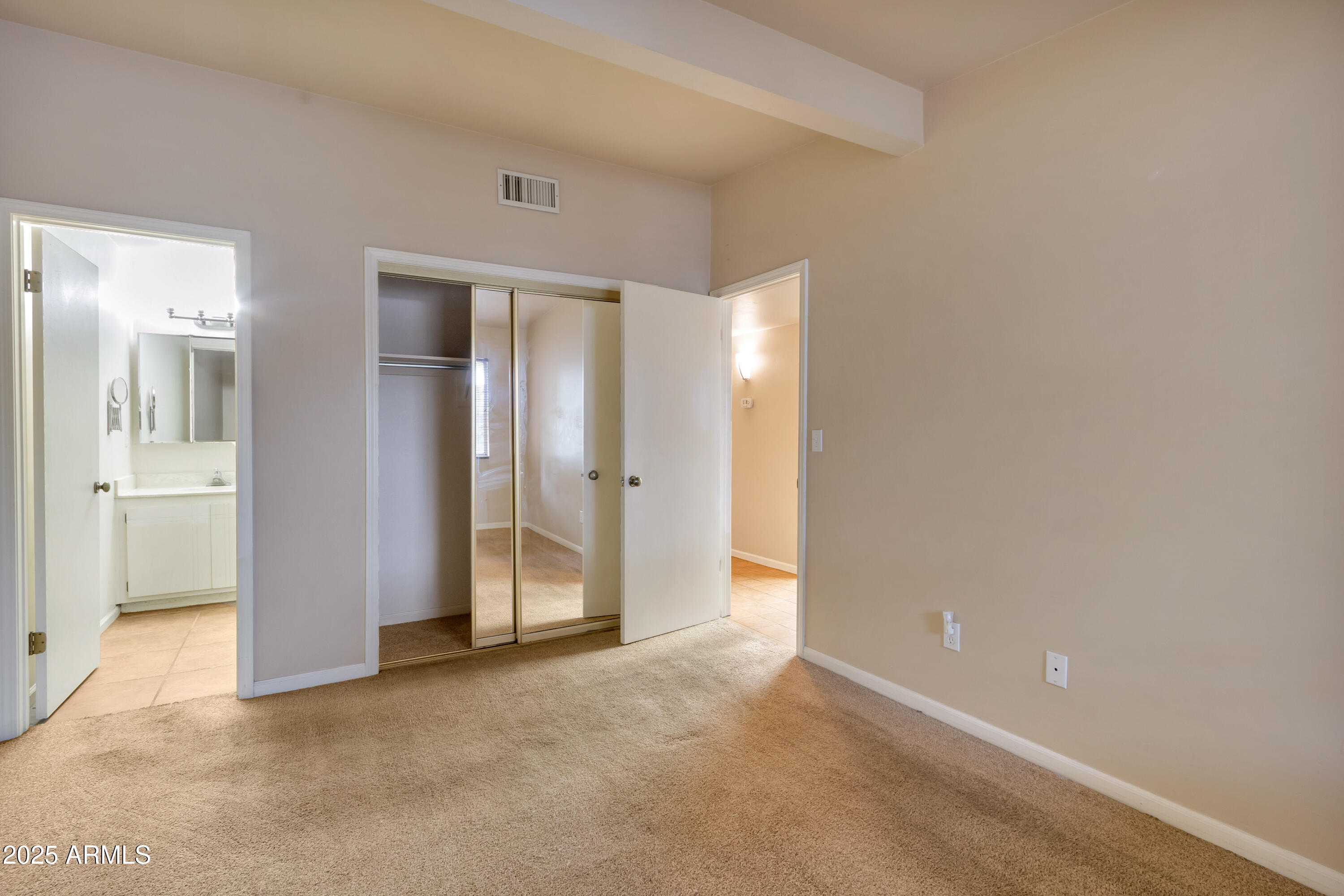 130 Castle Rock Road, Unit 45 Sedona, AZ 86351 - Photo 30 of 38 an empty room with windows and bathroom view