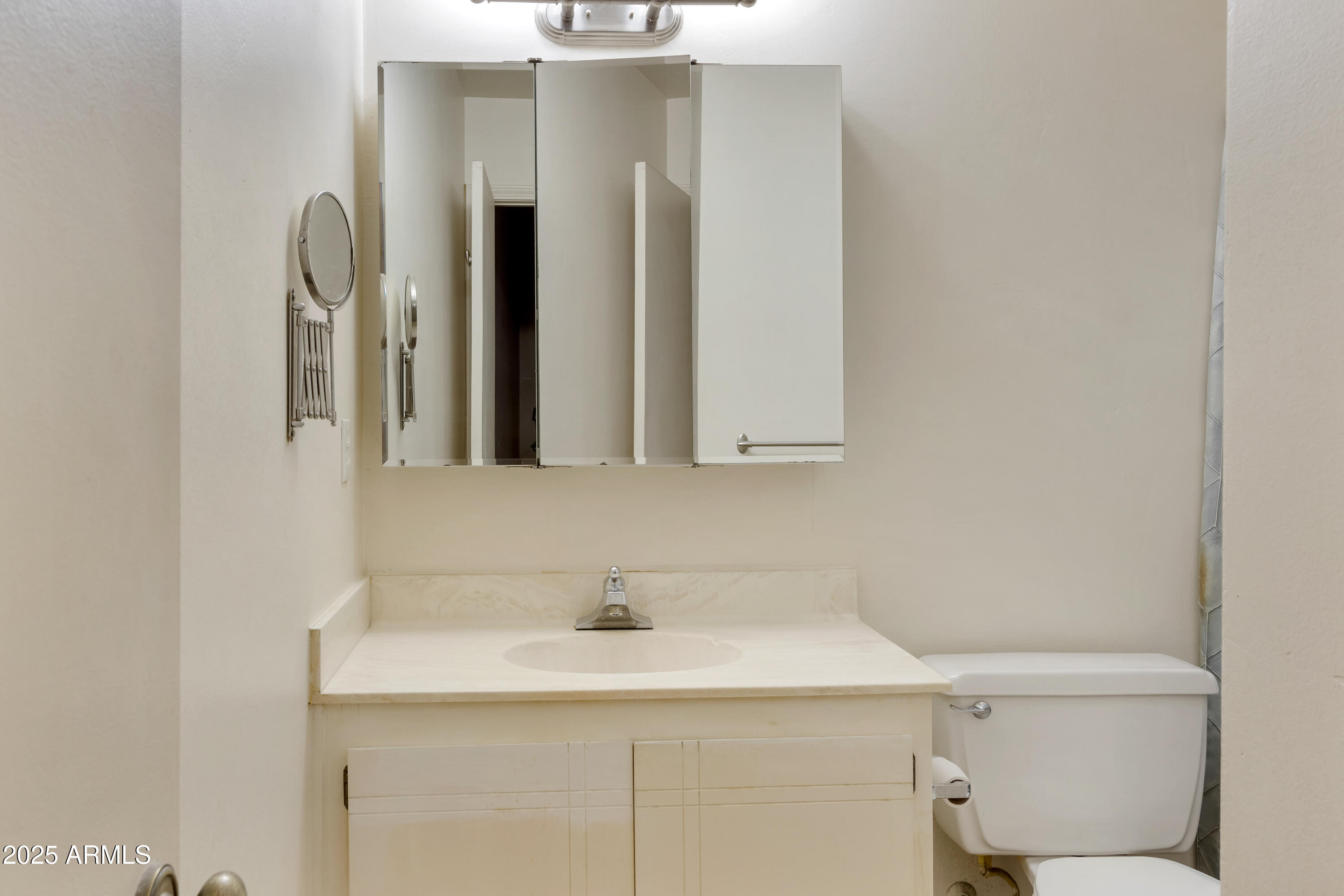 130 Castle Rock Road, Unit 45 Sedona, AZ 86351 - Photo 32 of 38 a bathroom with a sink and a mirror