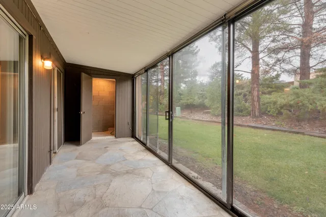 a view of a yard with an outdoor space