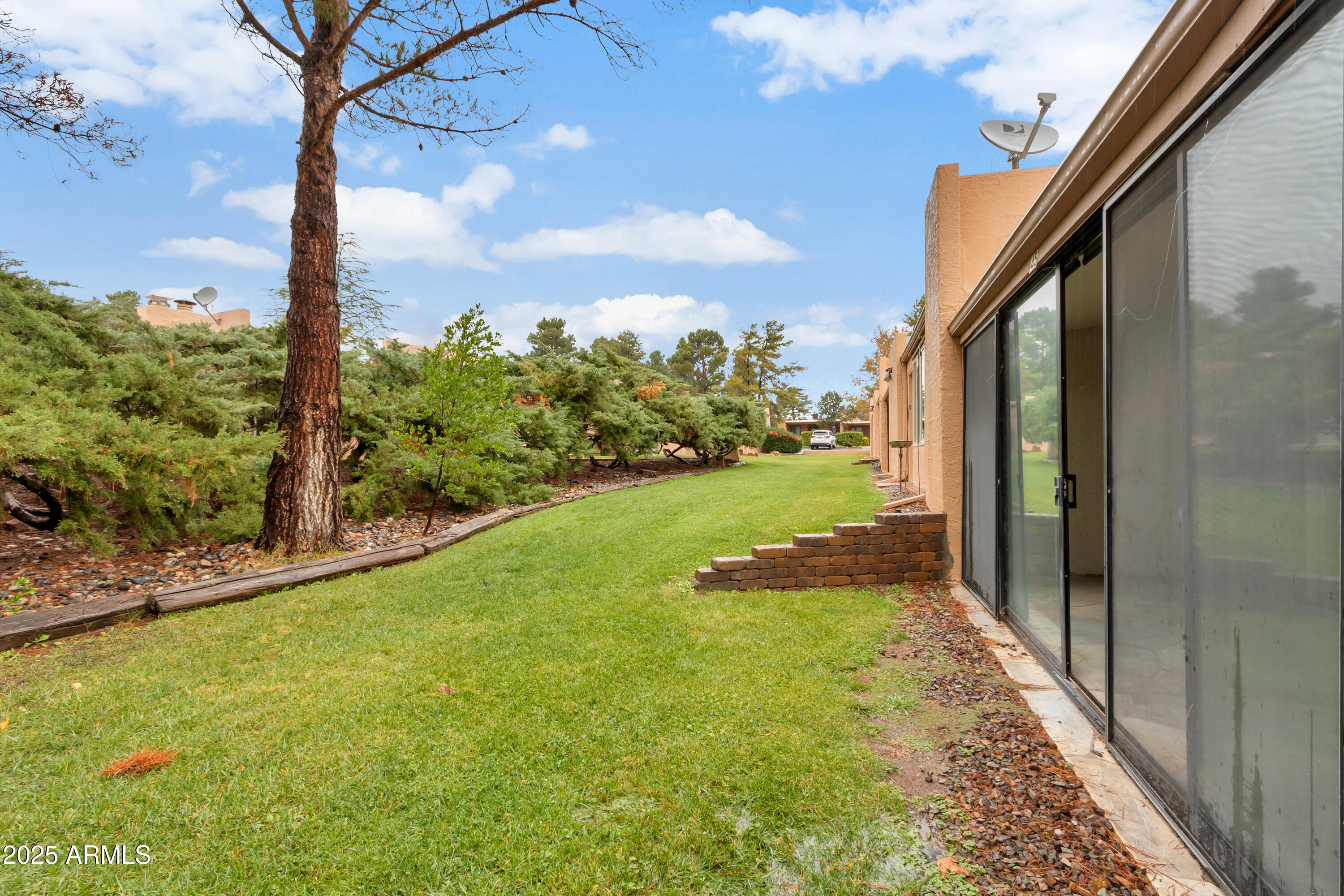 130 Castle Rock Road, Unit 45 Sedona, AZ 86351 - Photo 37 of 38 a view of a yard with an outdoor space
