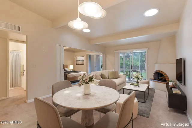 a kitchen with a stove sink and cabinets