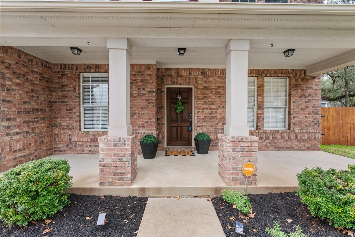 2400 Texan Drive Cedar Park, TX 78613 - Photo 1 of 1 a front view of a house with outdoor seating