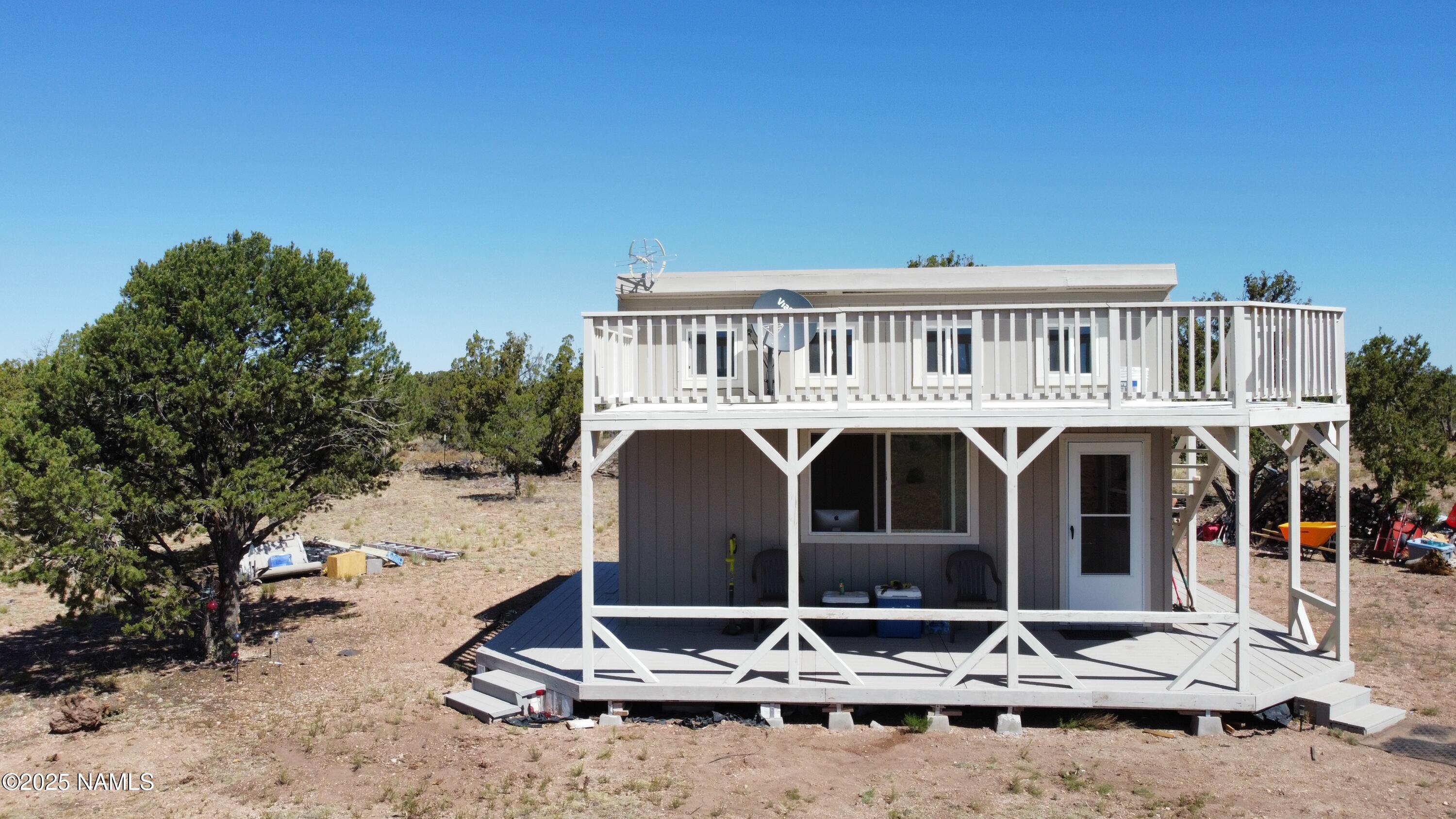 4681 Valle Road Williams, AZ 86046 - Photo 8 of 12 a front view of a house with a yard