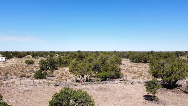 an aerial view of a fireplace with wooden floor