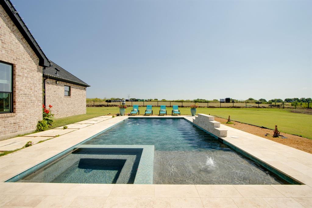 7299 Tom Trail Krum, TX 76249 - Photo 32 of 34 a view of swimming pool with a lounge chair