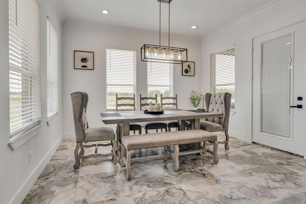 7299 Tom Trail Krum, TX 76249 - Photo 9 of 34 a dining room with furniture and window