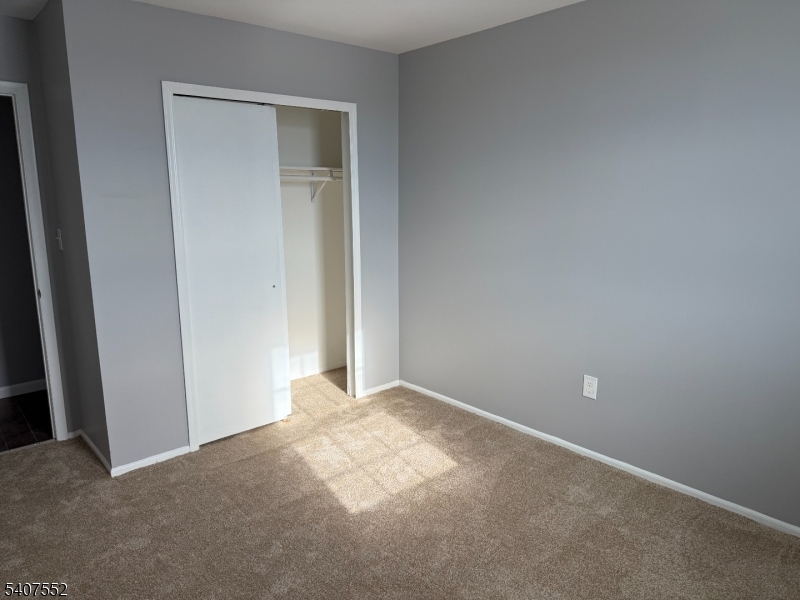 103 Park Avenue, Unit 206 Summit, NJ 07901 - Photo 18 of 25 a view of an empty room