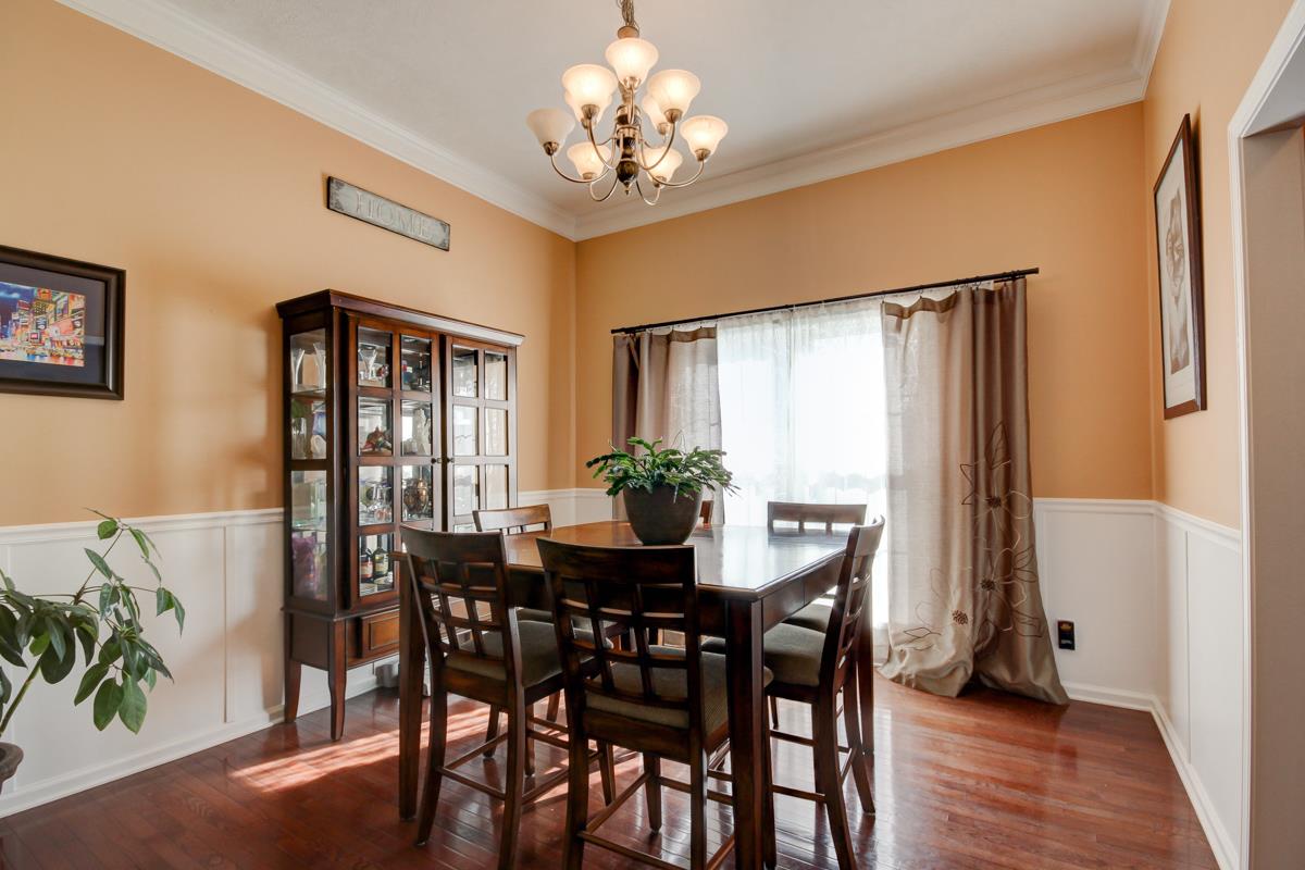 232 Cheshire Road Clarksville, TN 37043 - Photo 5 of 23 Formal dining room off the kitchen also with wood floors.