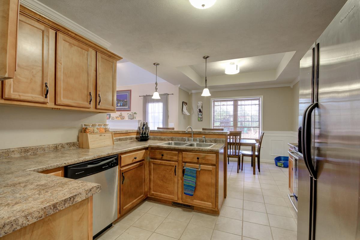 232 Cheshire Road Clarksville, TN 37043 - Photo 8 of 23 Stainless steel appliances and tile floors.