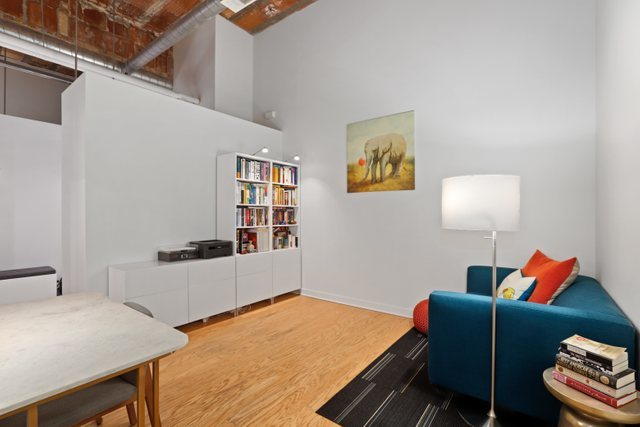 222 South Racine Avenue, Unit 207 Chicago, IL 60607 - Photo 21 of 27 a living room with furniture and a window