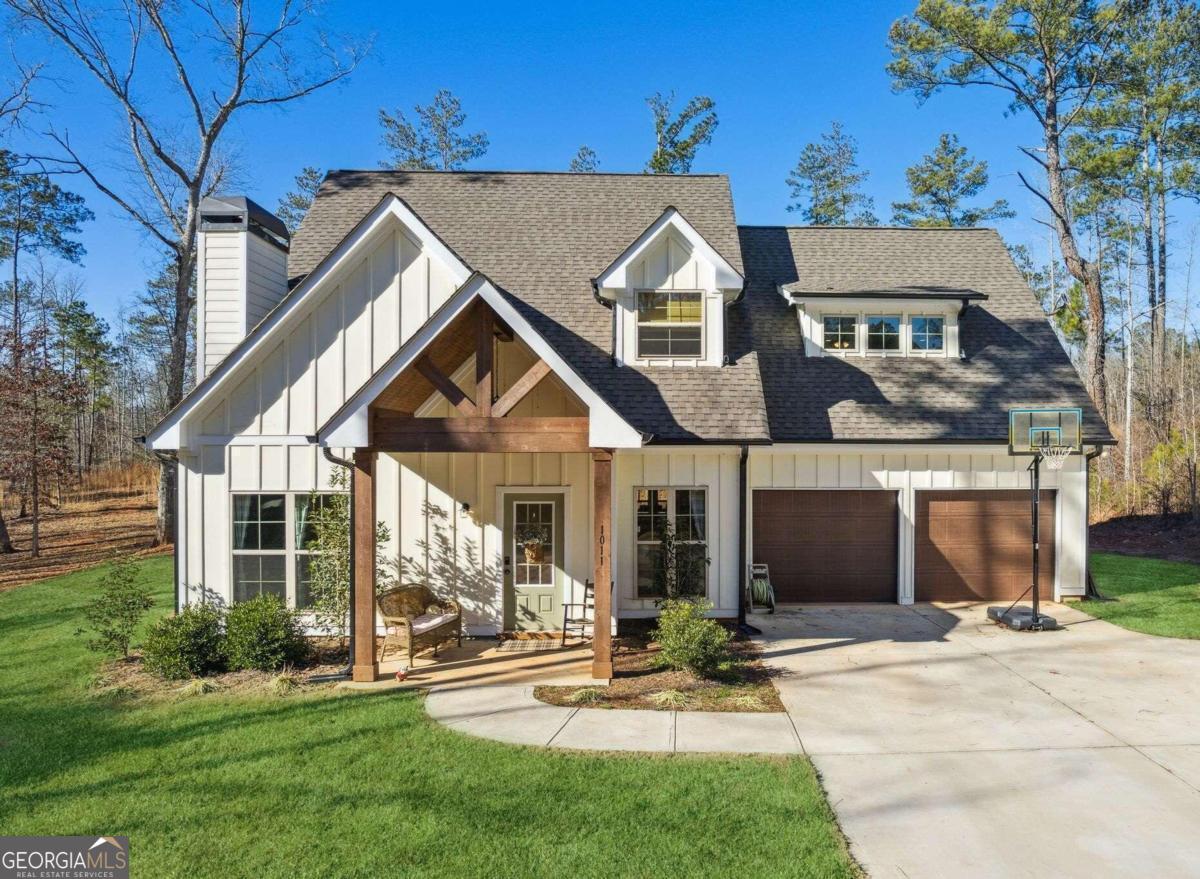 1011 Roscoe Davis Road Monroe, GA 30656 - Photo 1 of 1 a view of a yard in front of house