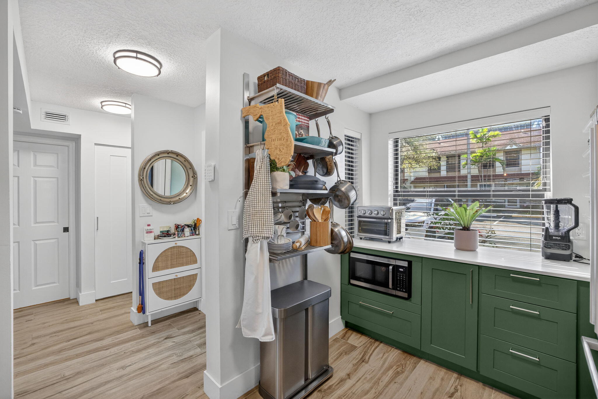237 City View Drive, Unit 237 Fort Lauderdale, FL 33311 - Photo 15 of 81 a kitchen with stainless steel appliances granite countertop a stove a sink and a refrigerator
