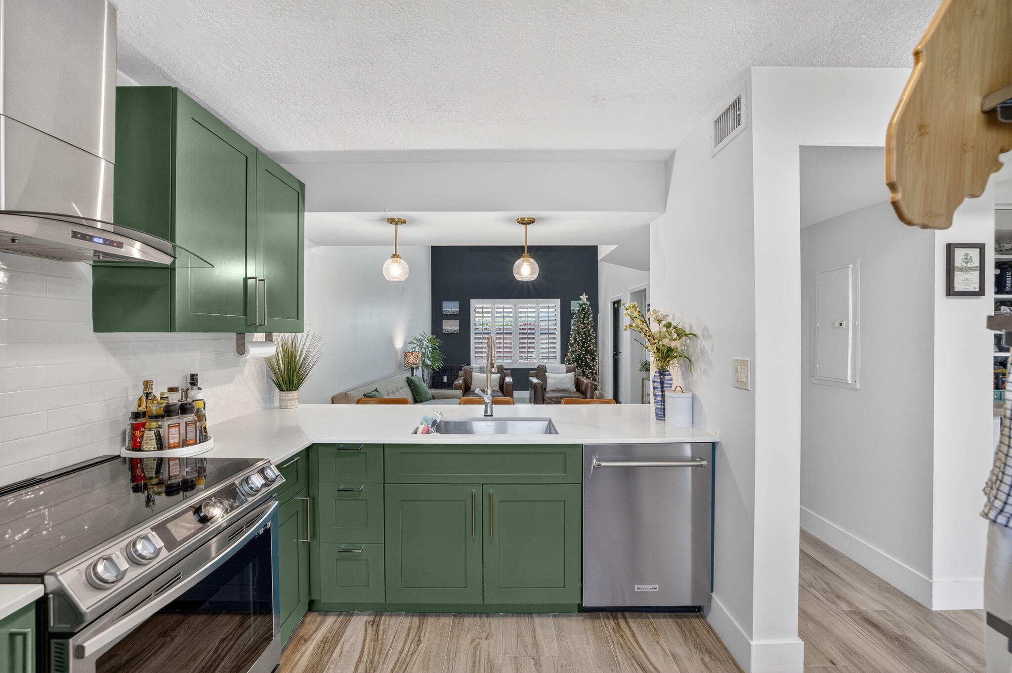 237 City View Drive, Unit 237 Fort Lauderdale, FL 33311 - Photo 17 of 81 a kitchen with a sink and a stove with wooden floor