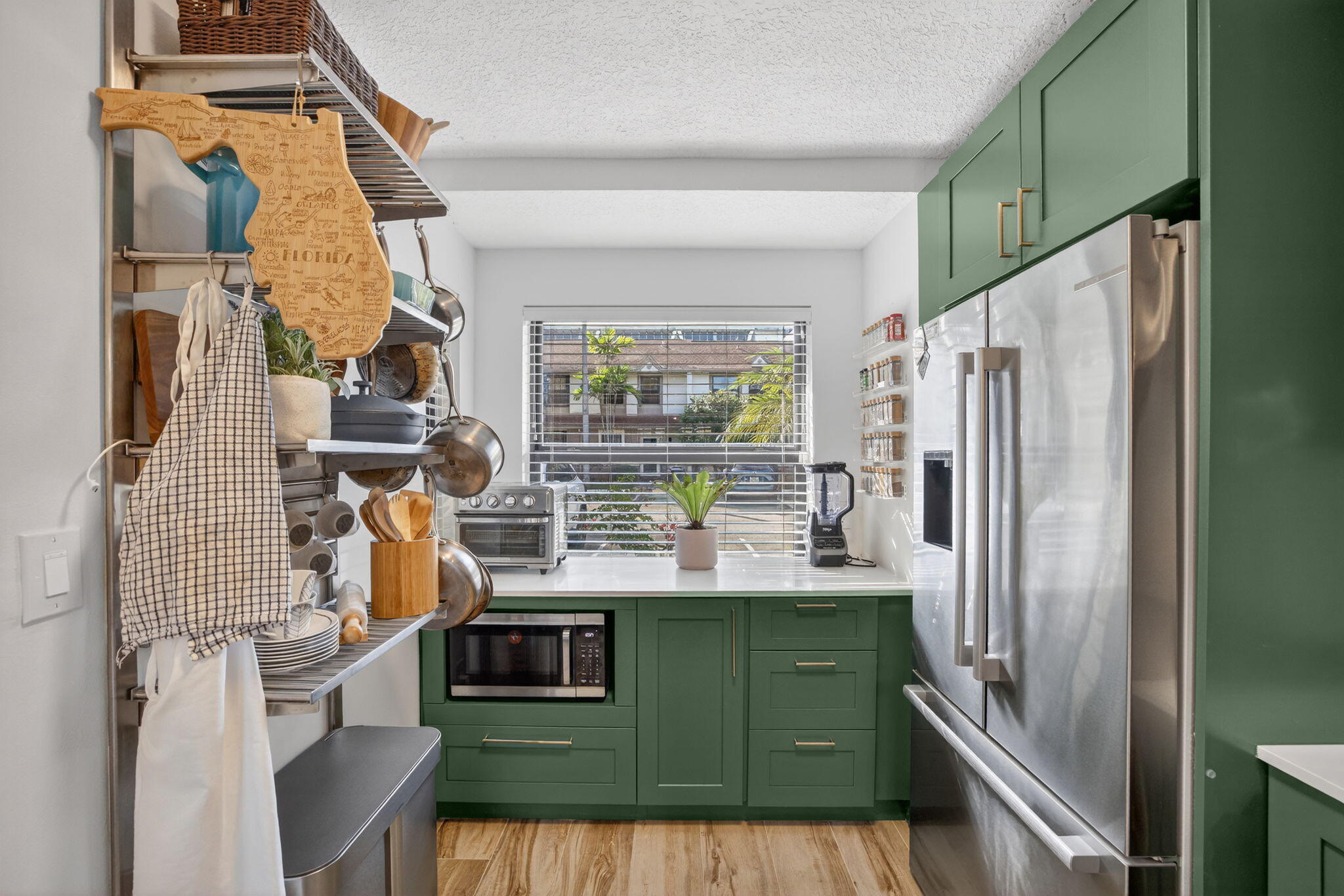 237 City View Drive, Unit 237 Fort Lauderdale, FL 33311 - Photo 19 of 81 a kitchen with a refrigerator and a sink