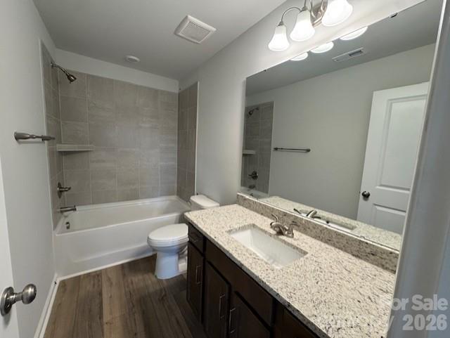 206 Rodeo Drive Shelby, NC 28150 - Photo 18 of 19 a bathroom with a granite countertop sink a toilet a mirror a bathtub and shower