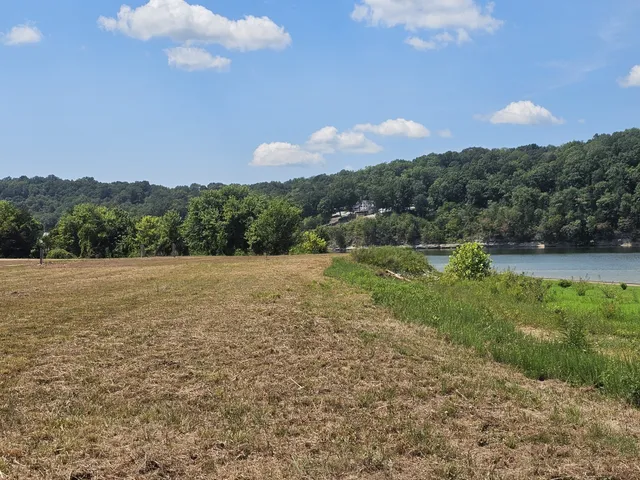 a view of an ocean beach and mountain