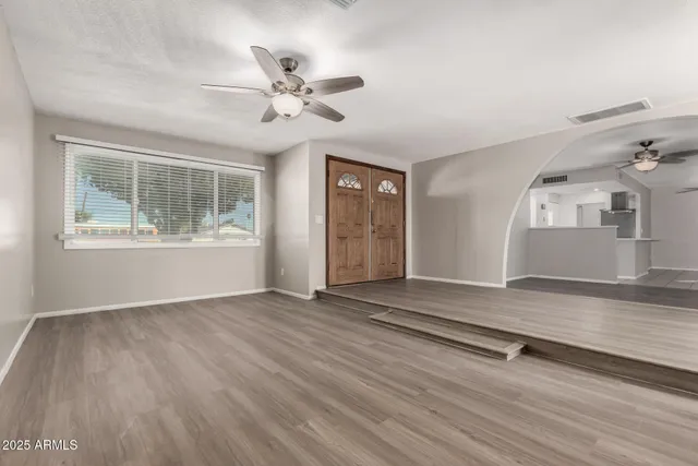a view of entryway with wooden floor