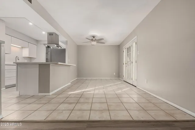 a view of a kitchen with a sink