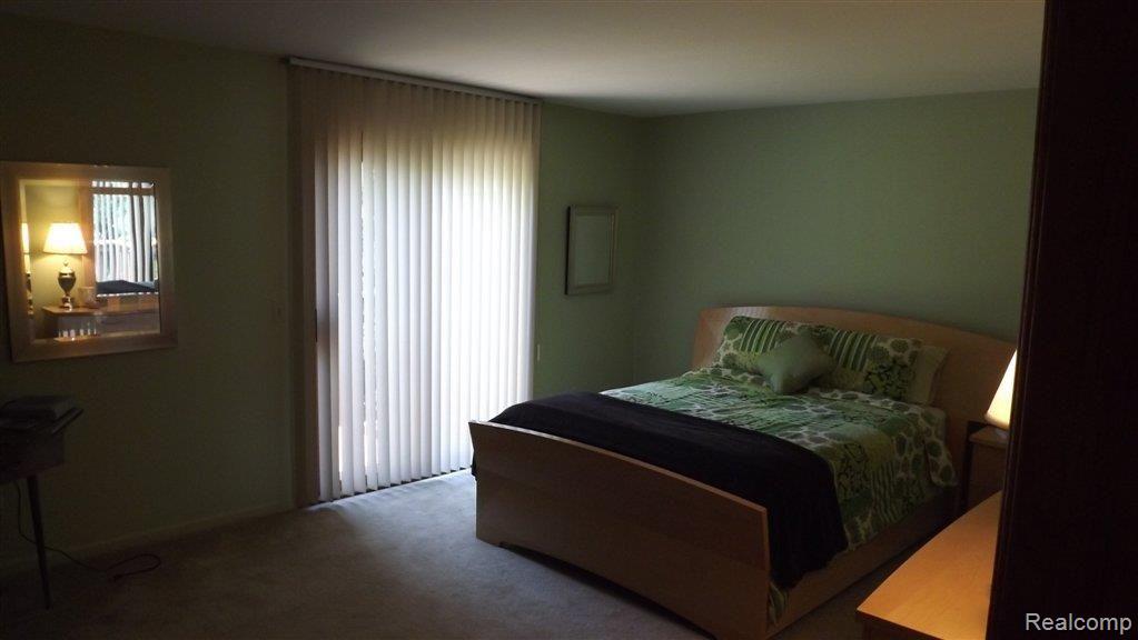 2223 Rochelle Park Drive, Unit 56 Rochester, MI 48309 - Photo 8 of 12 Master Bedroom