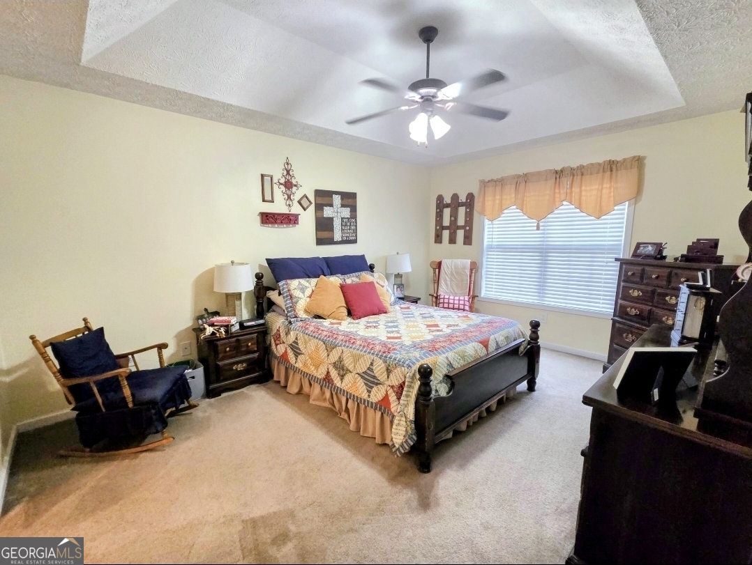 21 Baskin Heights Path Temple, GA 30179 - Photo 18 of 44 a bedroom with a bed and furniture