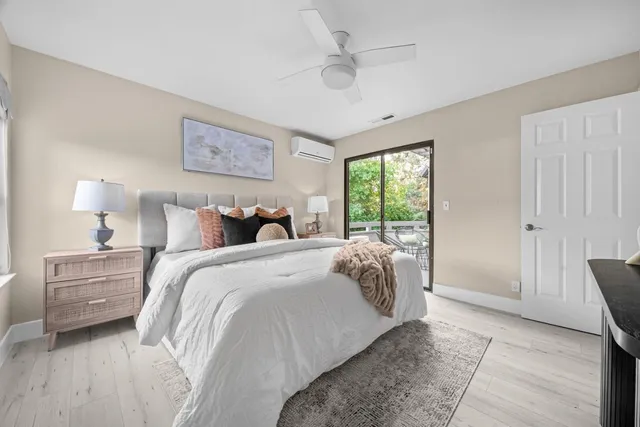 a bed room with a bed and a window