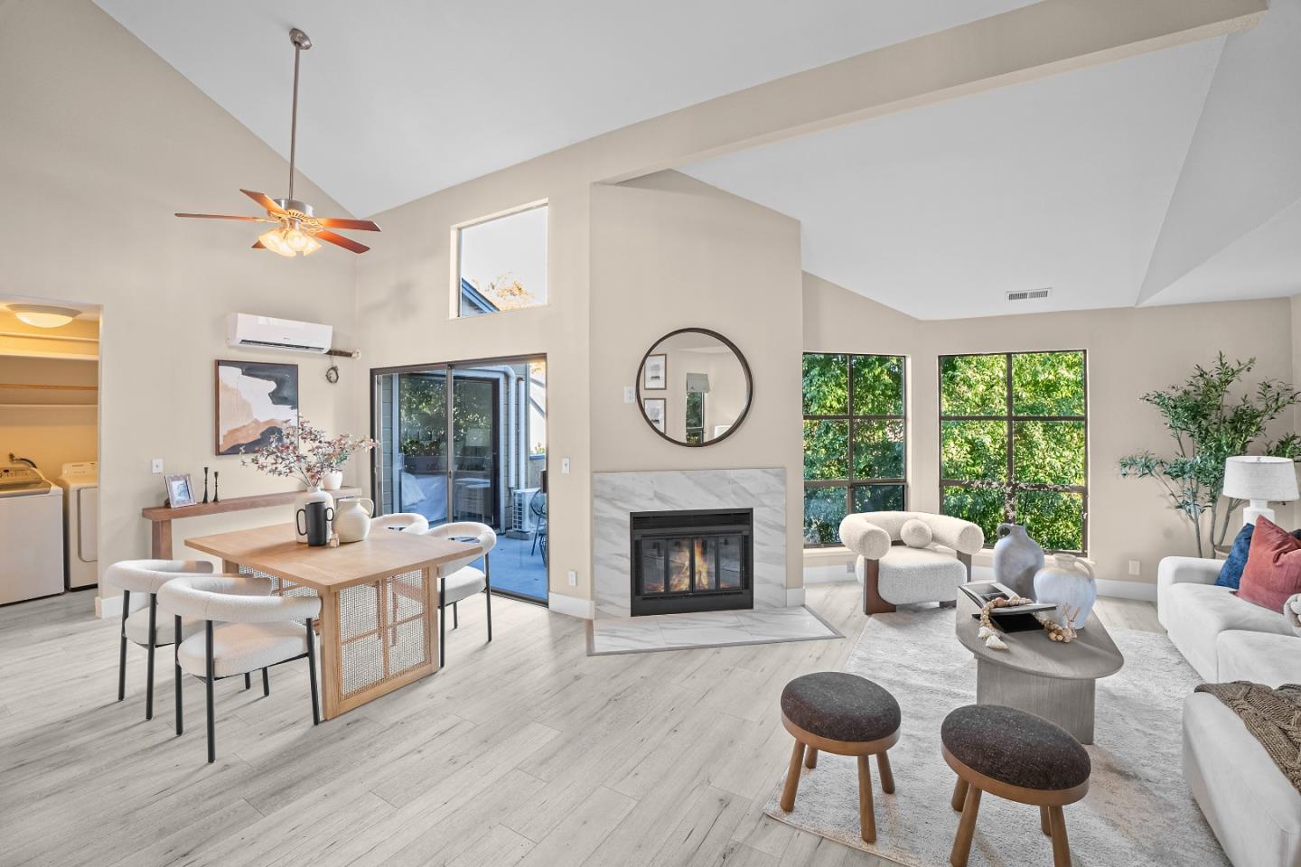 966 Silicon Drive San Jose, CA 95126 - Photo 5 of 31 a living room with furniture a fireplace a clock and a large window