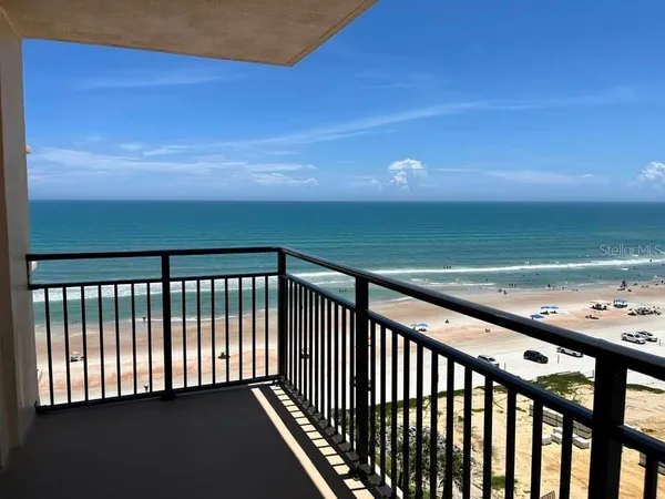 a balcony with an ocean view
