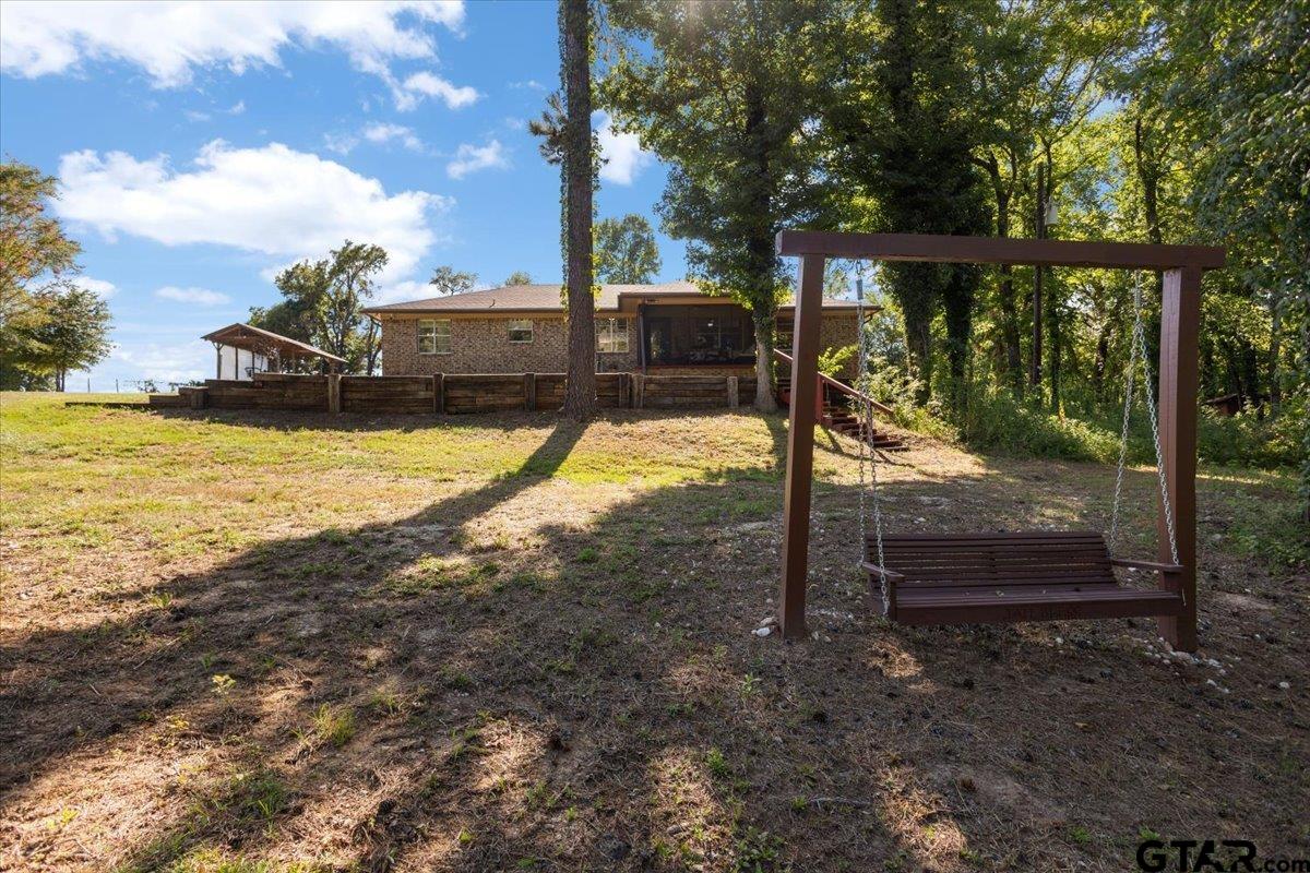 2855 County Road 1310 Rusk, TX 75785 - Photo 5 of 49 Front of Home and Swing that Overlooks Pond